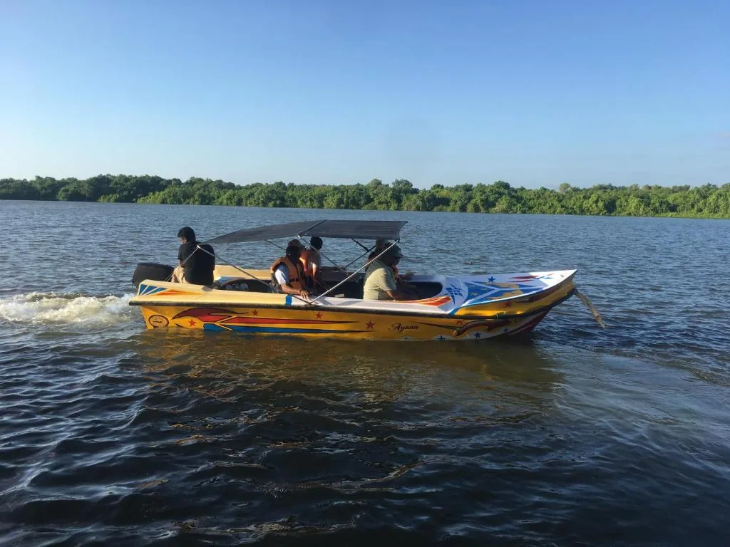Boat ride on the lagoon near Lake 10 Resorts